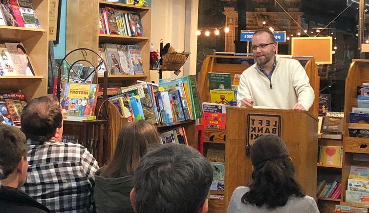 Dr. Ben Cooper, Assistant Professor of English, speaks about his book, Veteran Americans: Literature and Citizenship from Revolution to Reconstruction, before an engaged crowd at Left Bank Books.